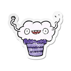 distressed sticker of a cartoon cupcake