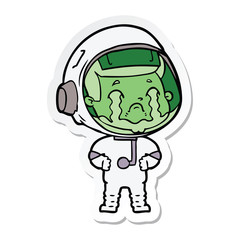 sticker of a cartoon crying astronaut