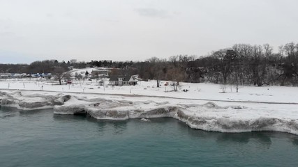 Michigan lake in Winter. Water, cold weather, bird's eye view, drone shots