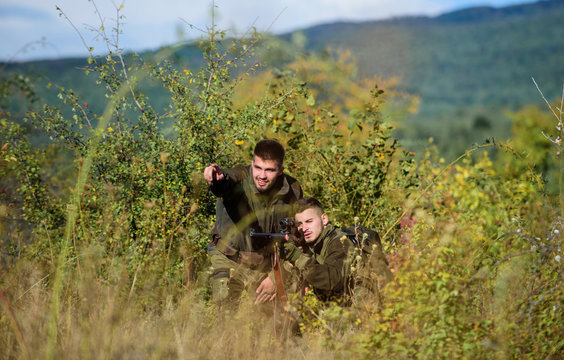 Army forces. Camouflage. Military uniform fashion. Hunting skills and weapon equipment. How turn hunting into hobby. Man hunters with rifle gun. Boot camp. Friendship of men hunters. nato