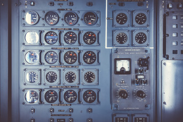 Old airplane control panel in cockpit - obrazy, fototapety, plakaty