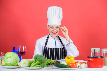 Culinary education. Culinary expert. Woman chef cooking healthy food. Fresh vegetables ingredients for cooking meal. Culinary school concept. Female in apron knows everything about culinary art