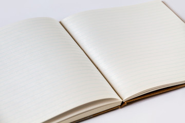 Open blank notebook closeup view