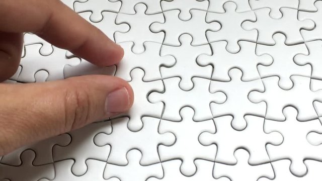 Jigsaw Puzzle piece put into missing places with Dollar money background, Succeed in Business concept, Debt settlement concept.