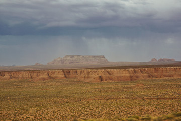 Fototapeta premium red rock desert rain and thunder coming