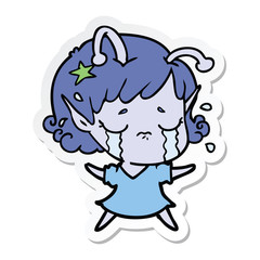 sticker of a cartoon crying alien girl