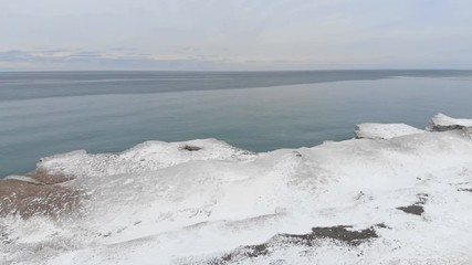 Michigan lake in Winter. Water, cold weather, bird's eye view, drone shots