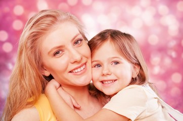 Happy Mother and daughter hugging