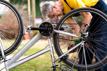 Man maintaining his bicycle for the new season