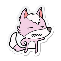 sticker of a cartoon wolf showing teeth