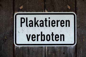 "Plakatieren verboten" German prohibition sign