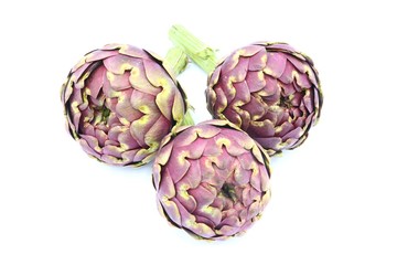 Fototapeta premium Fresh organic Artichokes on white background