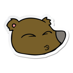 sticker of a cartoon bear face
