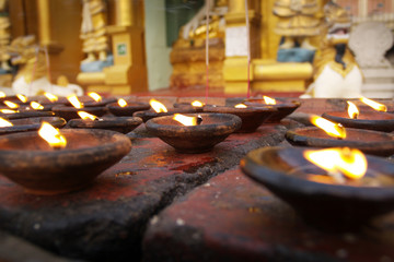 Holy candle in buddhist temple 