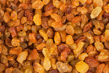 Delicious yellow raisins, highest grade. Delicious and beautiful background or wallpaper, top view