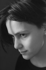 Impulsive portrait of a beautiful young girl with short hair