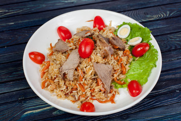 Pilaf. Meat dish of the peoples of Central and Central Asia, rice, meat and onions, suitable for the Nauryz or Navruz holidays, as well as during the Holy month of Ramadan and the holidays of Uraz Ait