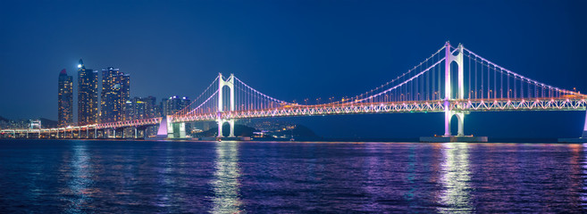 Gwangan Bridge and skyscrapers in the night. Busan, South Korea