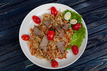 Pilaf. Meat dish of the peoples of Central and Central Asia, rice, meat and onions, suitable for the Nauryz or Navruz holidays, as well as during the Holy month of Ramadan and the holidays of Uraz Ait