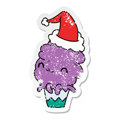 christmas distressed sticker cartoon of kawaii muffin