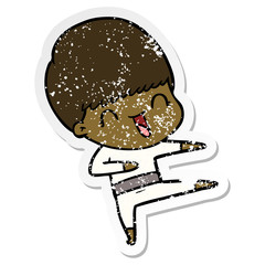 distressed sticker of a happy cartoon boy