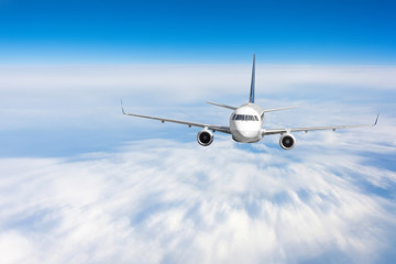 Naklejka na ściany i meble Modern airplane mith motion blur effect travel at sunny bright day