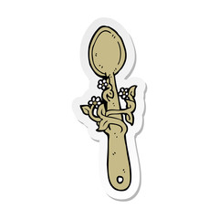sticker of a cartoon wooden spoon