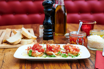 Italian Bruschetta with tomatoes Salsa in the restaurant to eat 