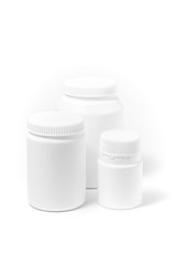 Three bottles of medicine white pills isolated on white
