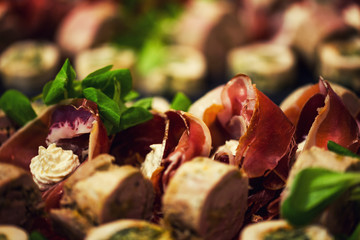 Appetizer roll with meat and bacon