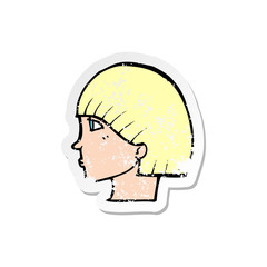 retro distressed sticker of a cartoon side profile face