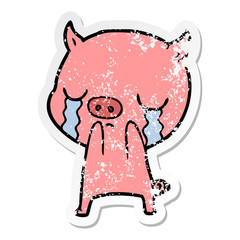 distressed sticker of a cartoon pig crying