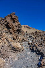 Trekking in the middle of lava fields ascending Teide volcano