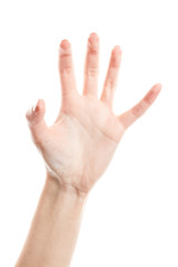Obraz premium Female hand isolated on white background. White woman's hand showing symbols and gestures. Palm