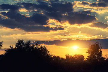 Fototapeta premium Dramatic colorful sky with cloud at sunset