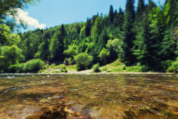 Obraz premium Beautiful blurred mountain and river background