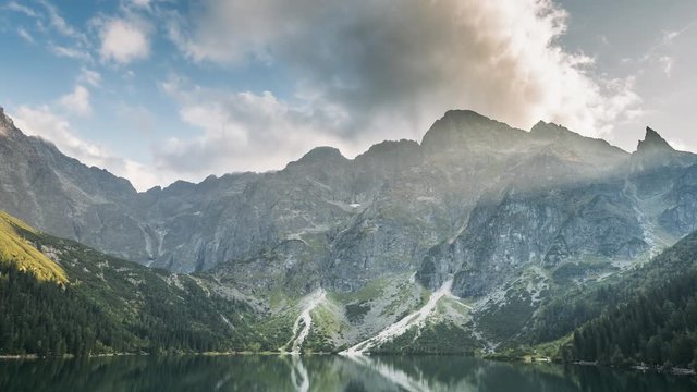 Tatra National Park, Poland. Famous Mountains Lake Morskie Oko Or Sea Eye Lake In Summer Evening. Beautiful Sunset Sunrays Above Tatras Lake Landscape.