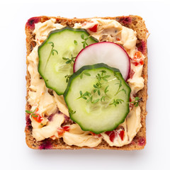 Sandwiches with cream cheese, vegetables and salami.