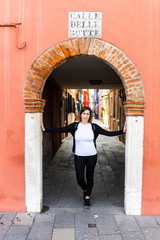 Fototapeta na wymiar Portrait of a middle aged woman on the streets of Burano, Venice, Italy