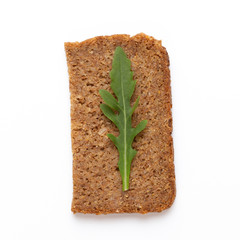 Rye bread slice on a white background.