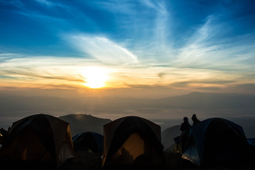 Fototapeta na wymiar Adventures Camping tourism doi hom pok at thailand, view forest landscape , outdoor in morning and sunset sky at Mon Sone View point.