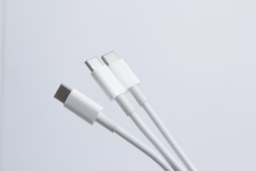 Three white type-c cables