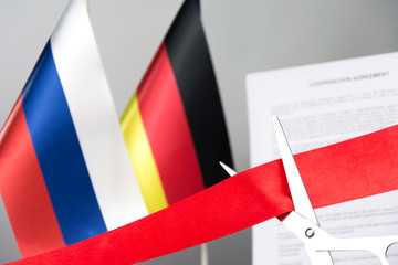 cuts ribbon russia germany contract blurred background
