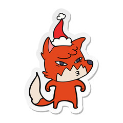 clever sticker cartoon of a fox wearing santa hat