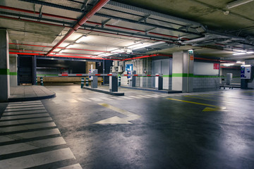 Empty underground parking lot industrial background