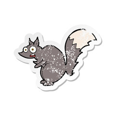 retro distressed sticker of a funny startled squirrel cartoon