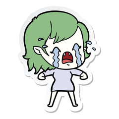 sticker of a cartoon crying vampire girl