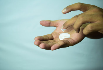 Applying moisturizing cream on hands. Skin care 