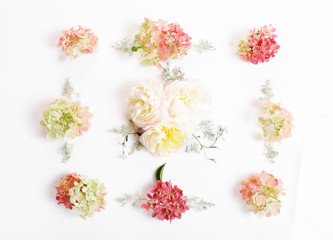 Festive flower composition on the white background. Overhead view