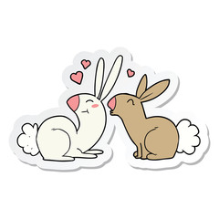 sticker of a cartoon rabbits in love